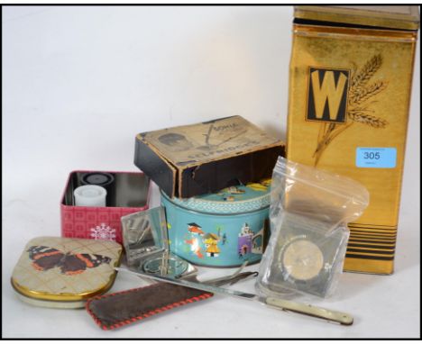 A collection of items to include a vintage Weetabix tin, collectors tin, sweet ti, selfridges razor, letter knife, butterfly 