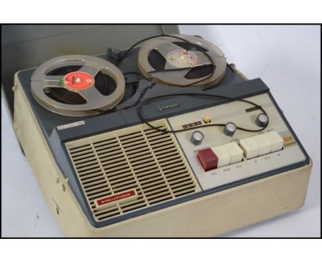 A vintage mid 20th century cased portable Reel to Reel tape recorder / player by Stella.
