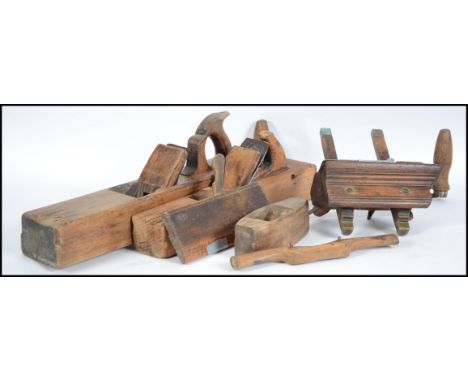 A collection of vintage 20th century wood Working tools to include planes, chisels etc.