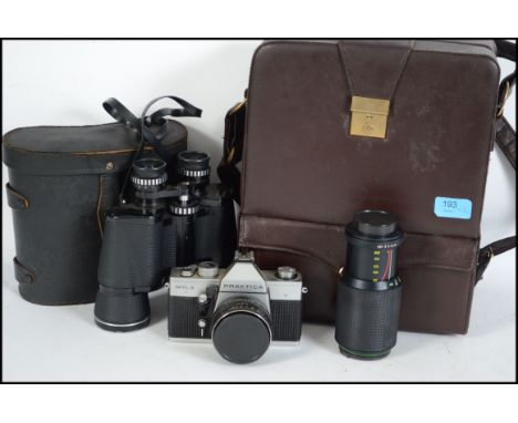 A cased vintage 35mm Practica camera and lenses together with a cased pair of binoculars.&nbsp;&nbsp;