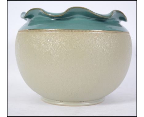 A Lovatt Langley Mild ceramic glazed planter of bulbous form with green glazed scalloped edge being stamped to the base for L