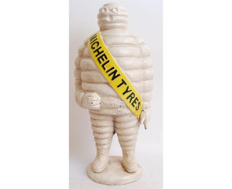 A large vintage style cast iron advertising figure of Bibendum, the Michelin Man. Hand painted with notation to front. Measur