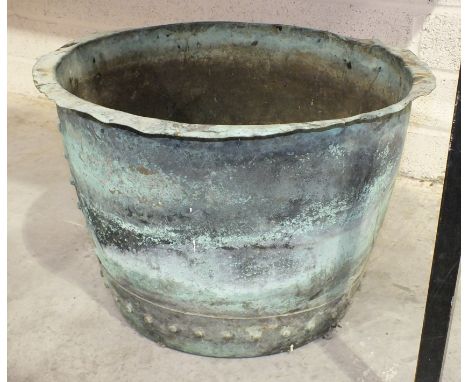 A copper planter, 34cm high, 50cm diameter.