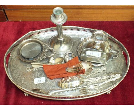 A pair of plated berry spoons, a plated chamber stick and other plated ware.