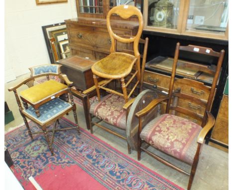Two wood frame armchairs, a corner chair, a trunk stand and other items.