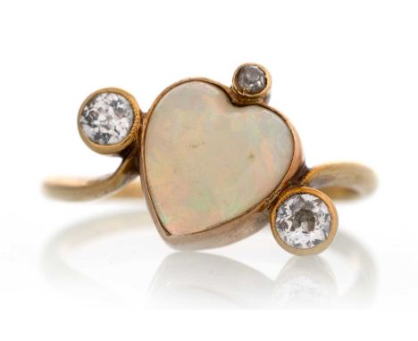 LATE VICTORIAN OPAL AND DIAMOND RING, IN EIGHTEEN CARAT GOLD  with three rose cut diamonds around the heart shaped opalQty: 3