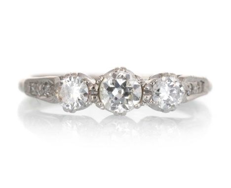DIAMOND THREE STONE RING, set with old cut diamonds totalling approximately 0.35 carats, in eighteen carat white gold, size J