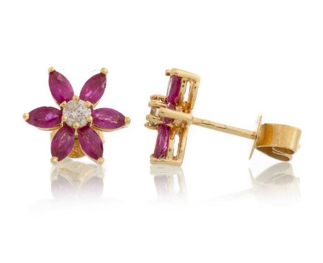 PAIR OF RUBY AND DIAMOND EARRINGS, in the form of a flower cluster, in eighteen carat gold