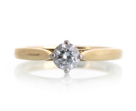 DIAMOND SOLITAIRE RING, set with a round brilliant cut diamond of approximately 0.45 carats, in eighteen carat gold, size M 1