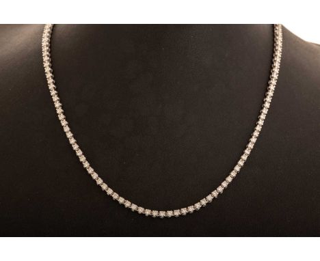 DIAMOND LINE NECKLACE, set with round brilliant cut diamonds totalling approximately 6.50 carats, in eighteen carat white gol
