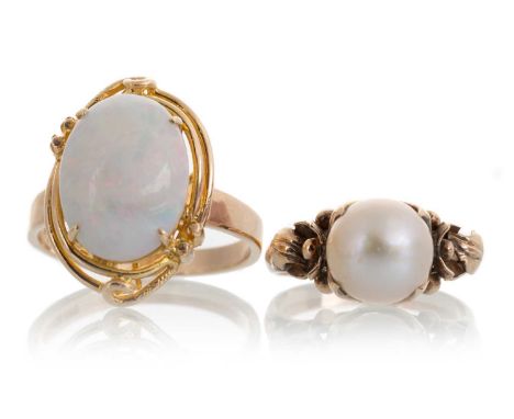 OPAL DRESS RING, IN FOURTEEN CARAT GOLD set with an oval opal, and another unmarked dress ring set with a single pearl Qty: 8
