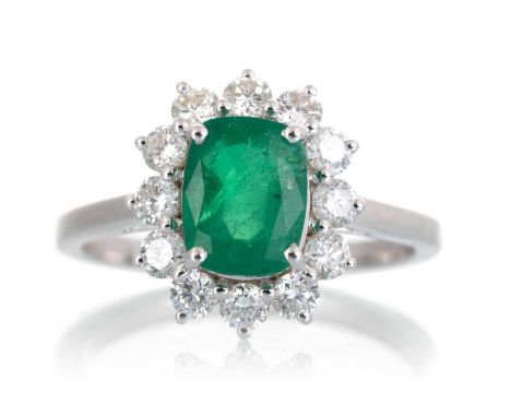 CERTIFICATED EMERALD AND DIAMOND RING, set with a cushion cut emerald of approximately 1.40 carats, within a halo of diamonds