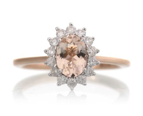 MORGANITE AND DIAMOND CLUSTER RING, set with a central morganite within a halo of diamonds, in nine carat rose gold, size M 1