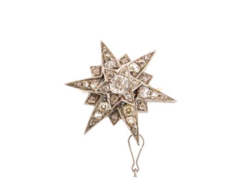 VICTORIAN DIAMOND STAR BROOCH, set with old cut diamonds totalling very approximately 1.40 carats, unmarked silver and gold28