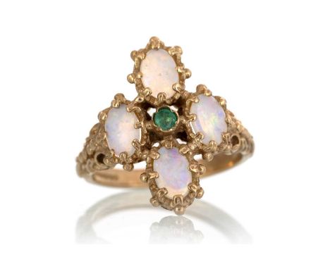 OPAL AND EMERALD RING, set with four opals around a central small emerald, in nine carat gold, size KQty: 4g