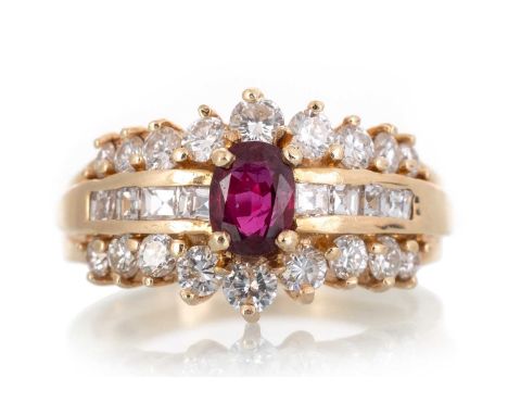 RUBY AND DIAMOND RING, set with central ruby flanked by step cut and round brilliant cut diamonds, marked 14K, size M 1/2Qty: