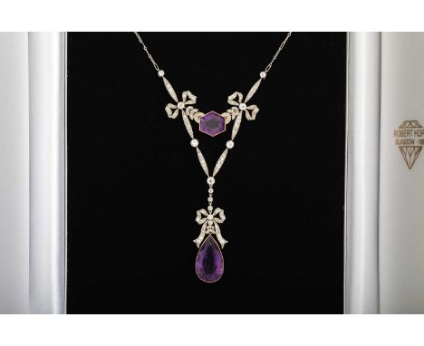 FINE AMETHYST AND DIAMOND LAVALIERE NECKLACE, 20TH CENTURY set in unmarked white and yellow gold, the hexagonal amethyst susp