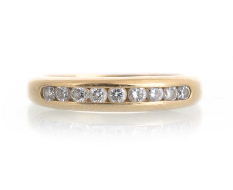 DIAMOND HALF ETERNITY RING, with channel set diamonds totalling approximately 0.50 carats, assay marks to the outer shank, si