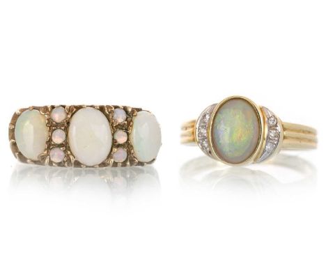 TWO OPAL RINGS, one set with a central opal flanked by diamond chips, marked 14K, the other set with a row of opals, unmarked