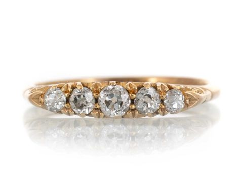 DIAMOND FIVE STONE RING, EARLY 20TH CENTURY  set with a graduated row of five rose cut stones, in eighteen carat gold, size P
