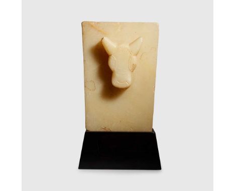 SABAEAN ALABASTER BULL STELE SOUTHERN ARABIA, C. 3RD CENTURY B.C. - 1ST CENTURY A.D. carved alabaster, of trapezoidal form, c