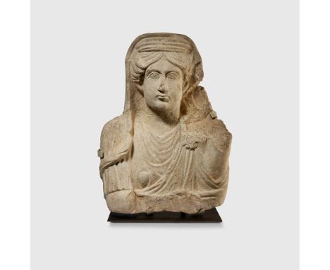 PALMYRIAN RELIEF OF A LADY NEAR EAST, 1ST - 3RD CENTURY A.D. carved limestone, the female figure is shown adorned in a draped