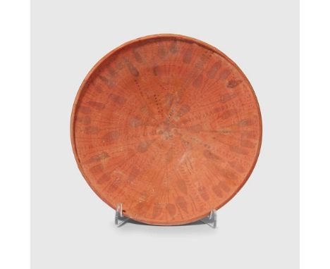 NABATEAN DISH NEAR EAST, 1ST CENTURY B.C. - 1ST CENTURY A.D. painted terracotta, standing on a rounded base, the shallow wall