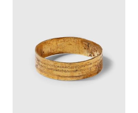HELLENISTIC GOLD BRACELET WITH INSCRIPTION NEAR EAST, CLASSICAL PERIOD OR LATER gold, the circular bangle with a stamped insc