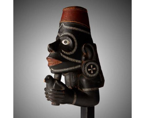 SOLOMON ISLANDS CANOE PROW, NGUZU NGUZU NEW GEORGIA ISLAND carved wood, red and white polychrome and mother-of-pearl, the fig