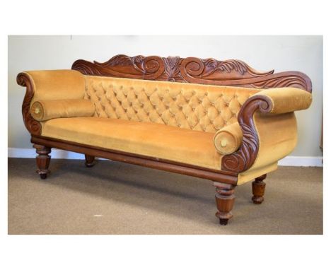 Victorian carved mahogany double scroll-end settee, the foliate scroll back rail over deep-buttoned back between S-scroll arm