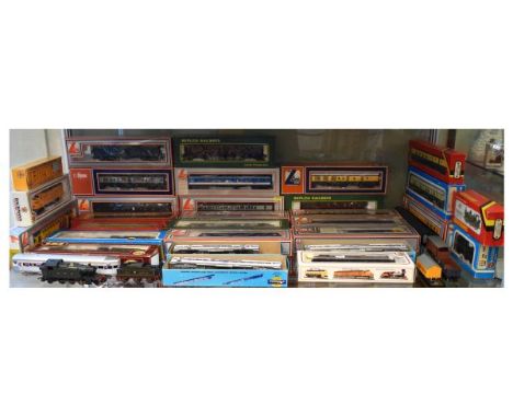 Quantity of 00 Gauge rolling stock and engines to include; Bachmann, Lima, Airfix, Hornby etc, approximately 37, all boxed  