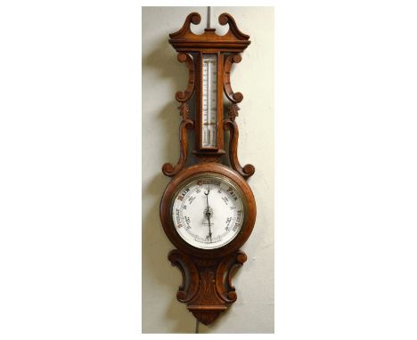 Early 20th Century carved oak aneroid barometer with mercury thermometer, 87.5cm high  