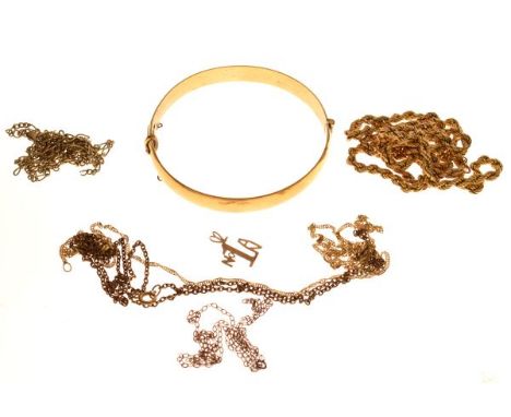 9ct gold rope twist design neck chain, a metal core bangle stamped 9ct, four fine neck chains, and a 'No 1' pendant  