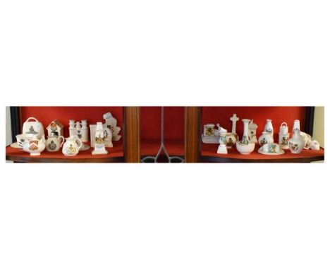 Crested china - Quantity of shaped pieces primarily West Country crests (one shelf)  