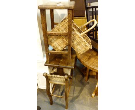 Two stools a table and stair basket