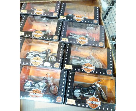 Eight boxed 1/18th scale Harley Davidson motorcycles, all different models