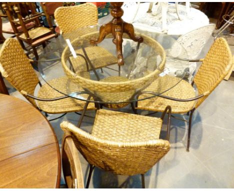 Glass topped metal and rattan table and four matching chairs