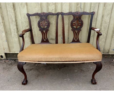 19th century mahogany sofa with carved back splats, on carved cabriole legs and ball and claw feet,