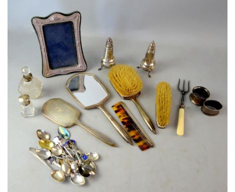 Cut glass and silver mounted scent bottle, Birmingham 1899, silver photograph frame, London 1987, collection of silver spoons