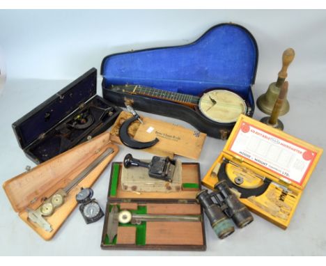 Keech banjo ukulele and a pair of Marine binoculars, boxed micrometers, 50 cal trench art table lighter, school bell etc