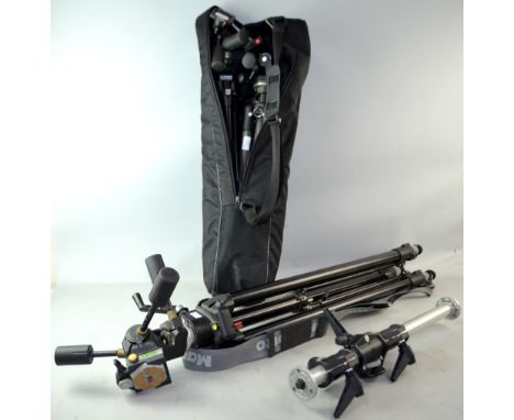Two Manfrotto camera tripods and another,
