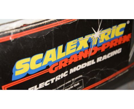Four Scalextric boxed sets, including two Grand Prix 8 (4)