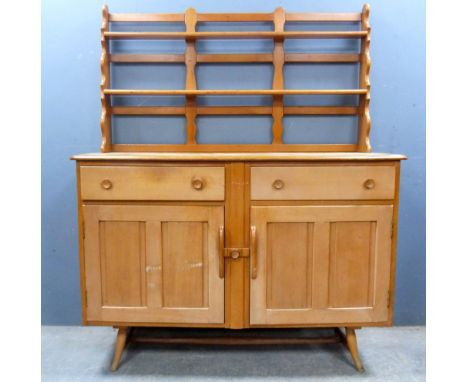 Ercol sideboard with raised open back over two drawers and cupboards, on turned supports