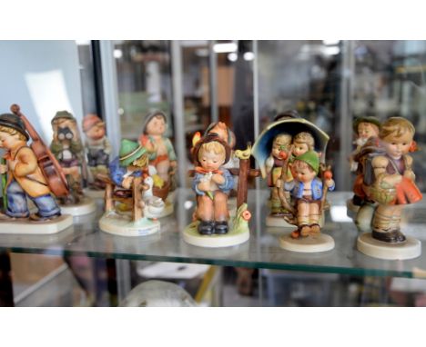 Collection of sixteen Hummel figures,