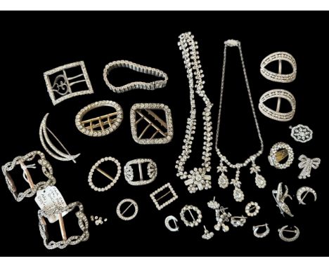 A number of white metal and silver paste and marcasite jewellery items. Also some vintage paste buckles, two believed to be e