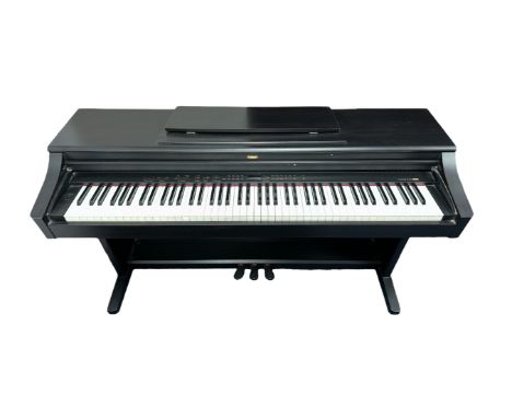 A Korg Digital Piano - EC500/EC300 Concert series. Piano is in excellent condition and fully functional. Comes with original 