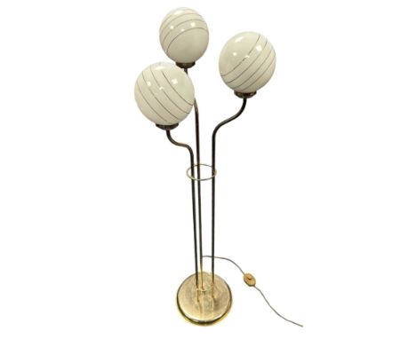 Mid 20th Century European glass globe floor lamp, with three brass standing arms and glass globe shades, round glass globe co