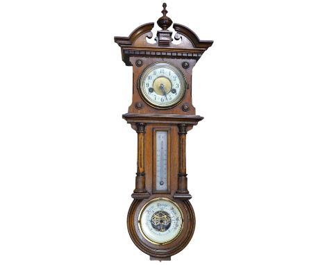 A late 19th century walnut wall clock, barometer and thermometer combination, striking on a coiled gong, 65cm high. Condition