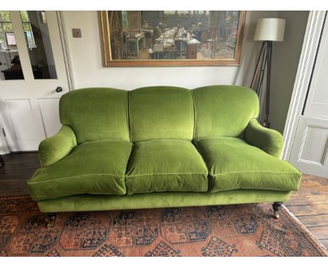 A Sofa Workshop 'Lady May' English roll arm green velvet four seater settee, Howard style sofa, seating generously feather fi
