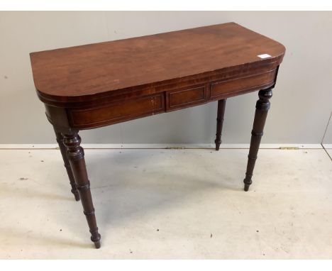A Regency mahogany folding top card table, width 91cm, depth 44cm, height 73cm. Condition - fair